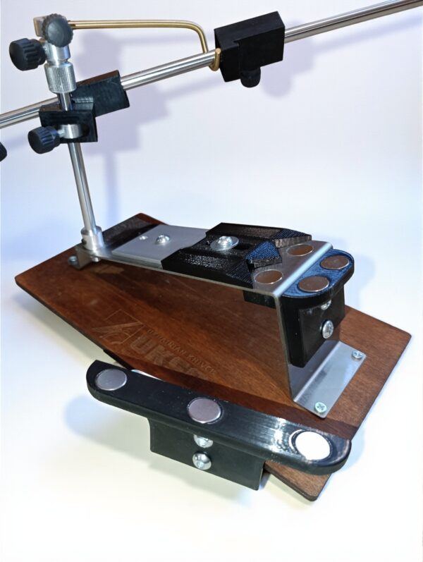 Three-Point Stop is a precision-engineered platform designed for secure fixation of kitchen and large knives on the UKSG Magnetic Sharpex sharpening system Three-Point Stop is a precision-engineered platform designed for secure fixation of kitchen and large knives on the UKSG Magnetic Sharpex sharpening system