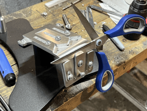 Scissors sharpening module for the UKSG Falcon sharpening system