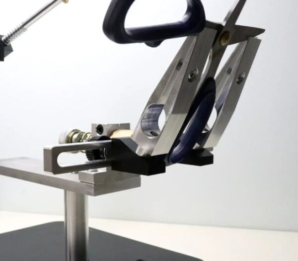 Adapter for sharpening scissors on a sharpener with a rotary mechanism Adapter for sharpening scissors on a sharpener with a rotary mechanism